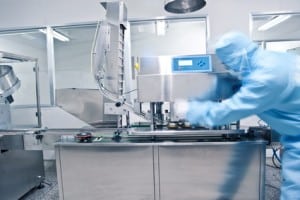 Technicians working in the pharmaceutical production line